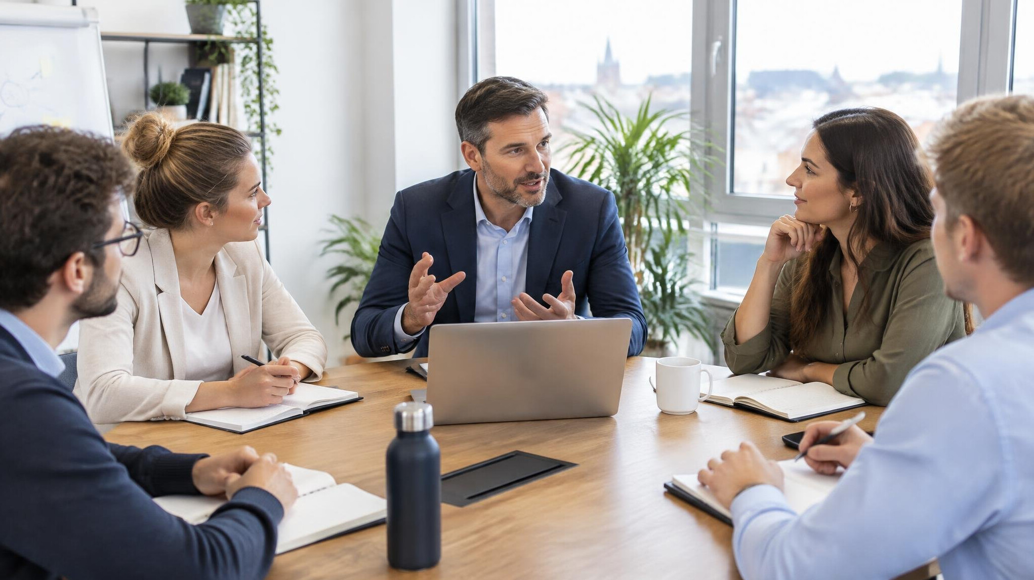 Business team meeting with notes on a table